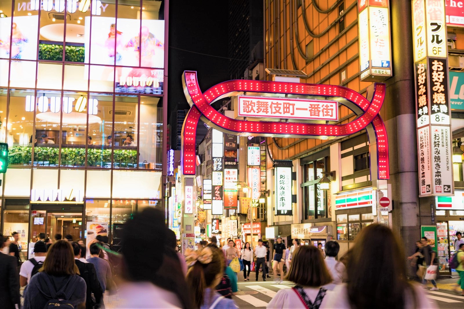 The bustling street with neon lights in Shinjuku