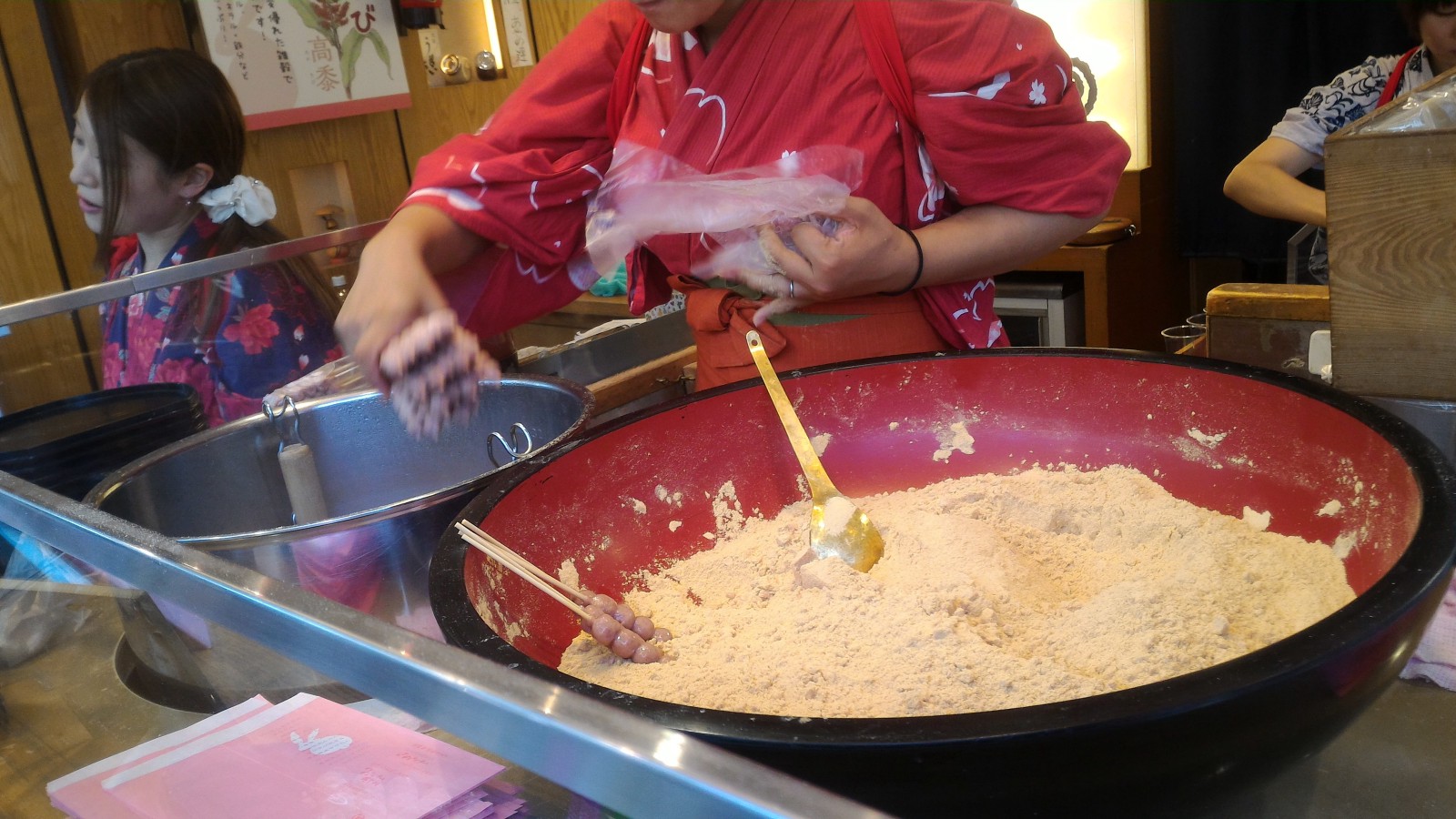 Mochi cakes covered by roasted soybeans flour