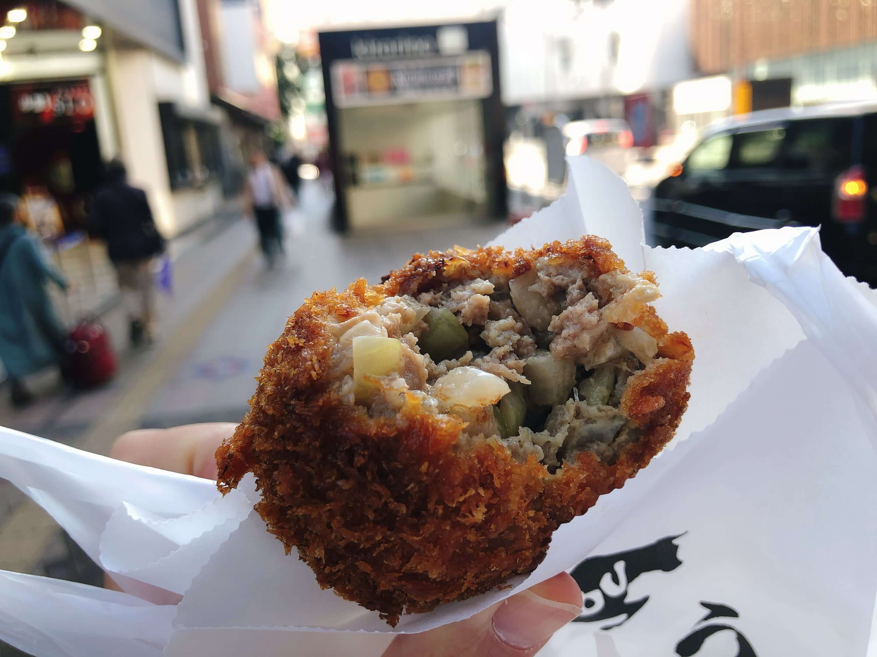 Menchi-katsu (deep-fried minced meat) sold at Sato in Daiya Shopping Arcade