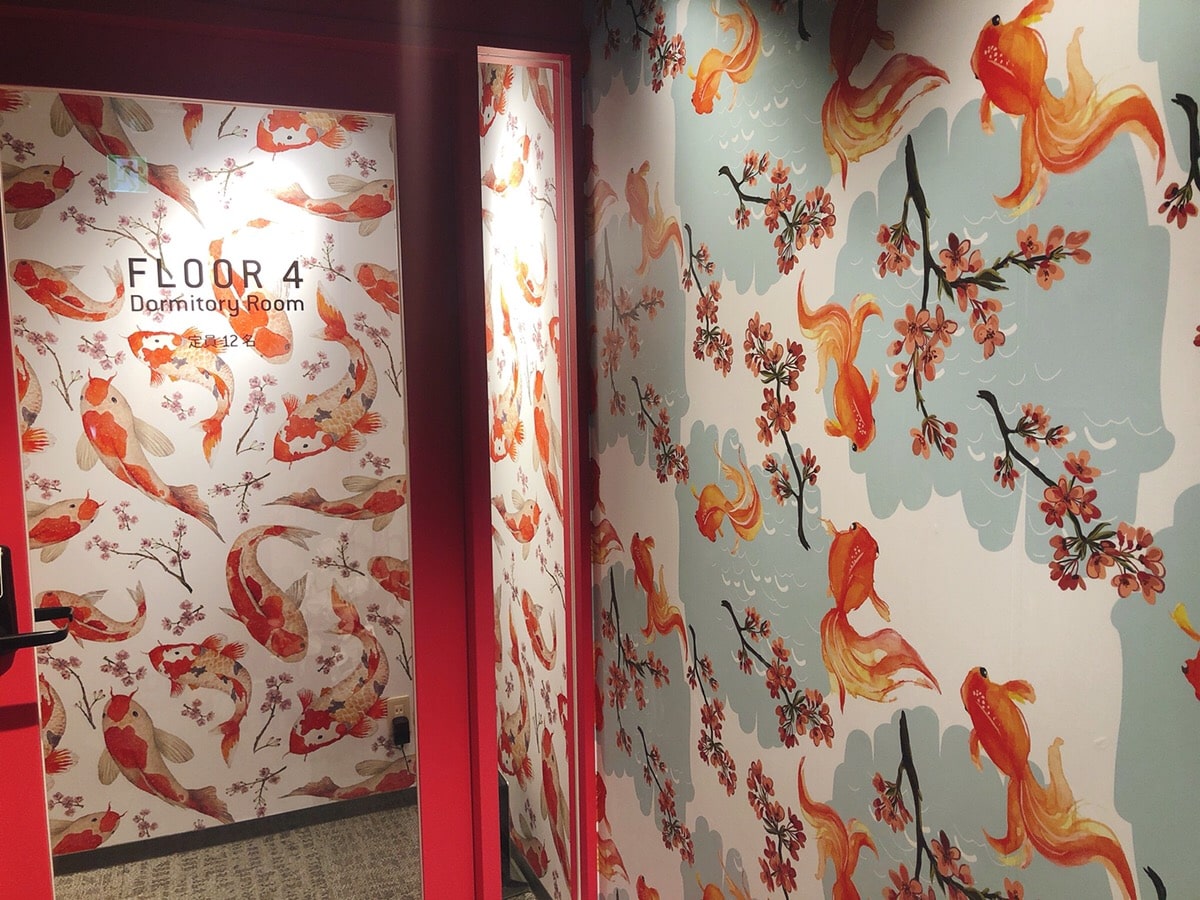 goldfish and carp painted on the wall.