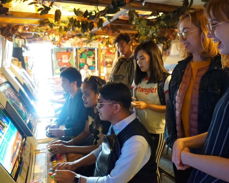 Enjoying games at the amusement arcade in Akihabara