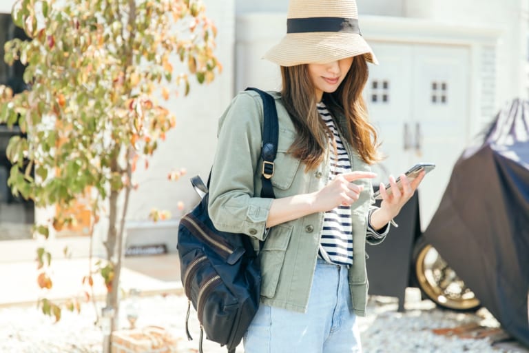 girl checking on mobile phone