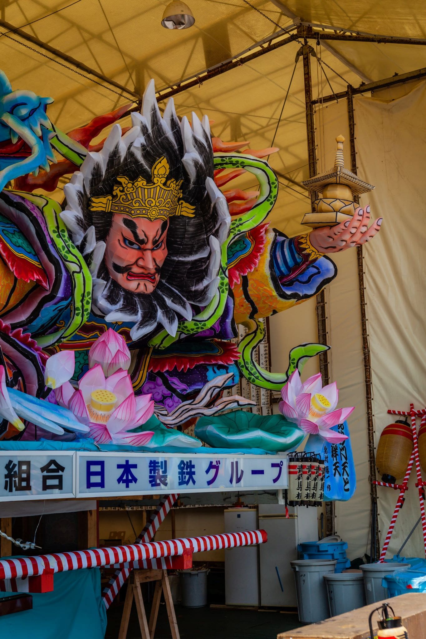 Nebuta floats on temporary warehouses while awaiting for the parade