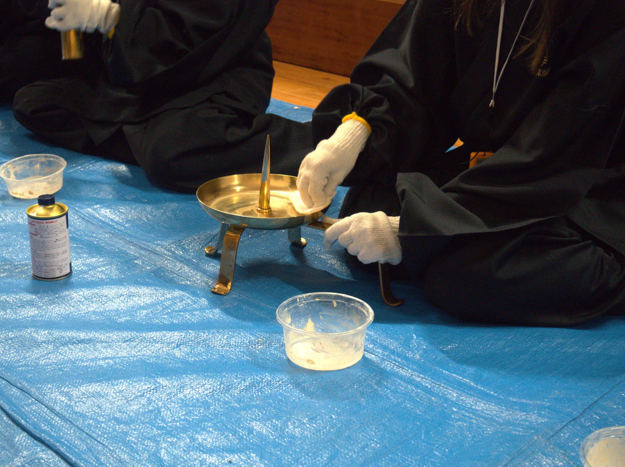 polishing golden artifacts at tsukiji hongwanji